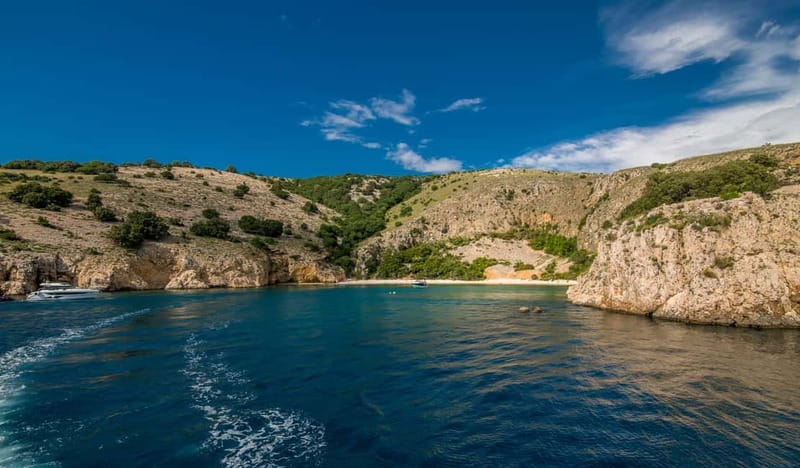Krk: Golden Beach and Blue Cave Cruise with Welcome Drink - Swimming inside Plavnik Cave