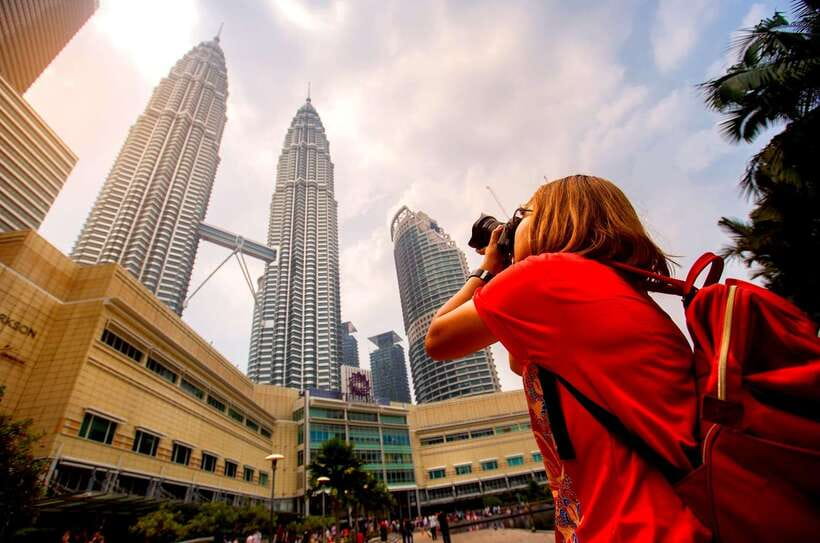 Kuala Lumpur Full-Day Sightseeing Tour with Batu Caves - Central Market for batik, crafts, and practical souvenirs