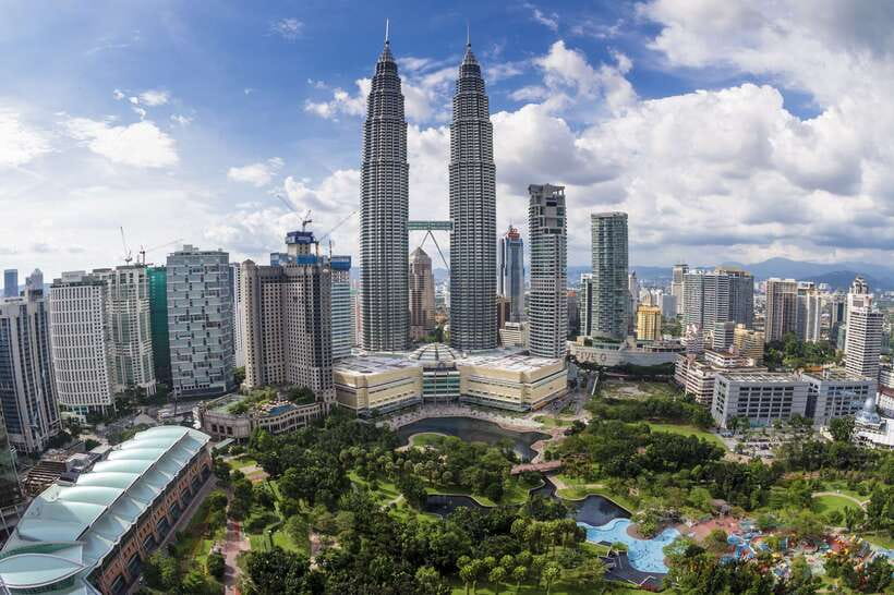 Kuala Lumpur Full-Day Sightseeing Tour with Batu Caves - The Petronas Towers, Kuala Lumpur’s sharp modern edge