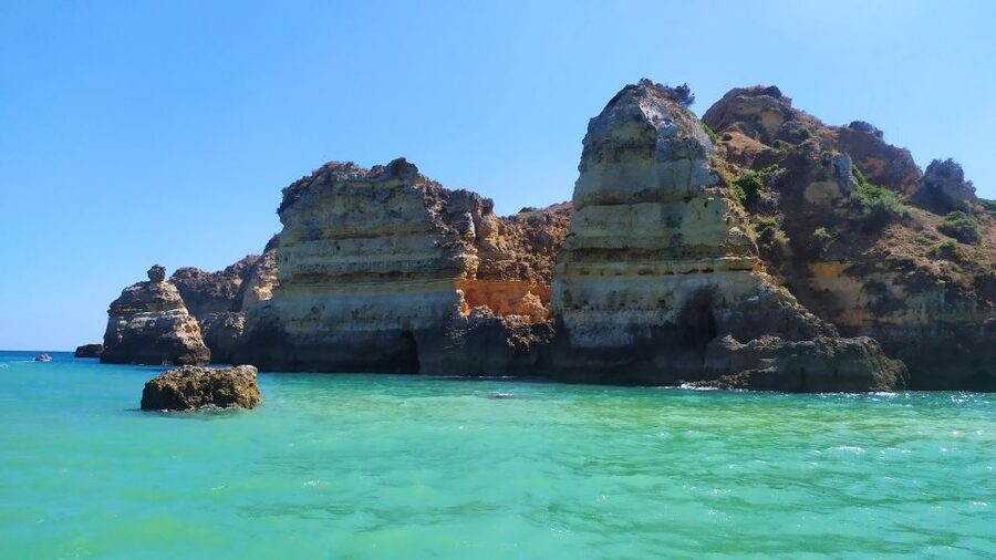 Lagos Grotto Trip in Different Languages - What the small motorboat changes