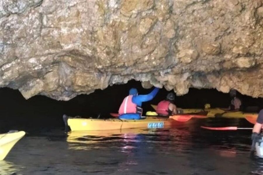 Lefkada: Hidden Blue Cave Kayak Trip with Lunch & Fruits - Entering the Blue Cave through its small opening