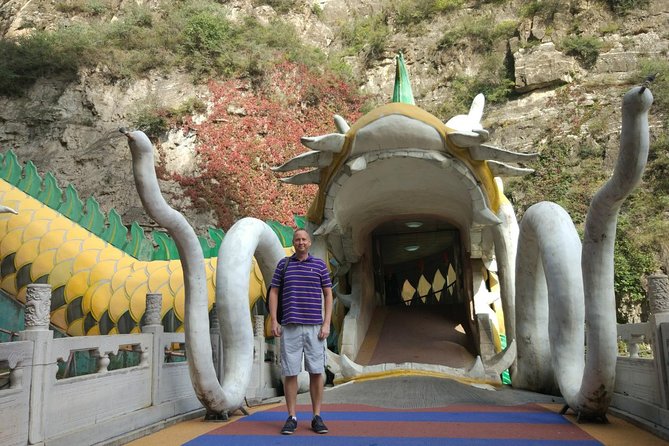 Longqingxia Gorge Cruise and Guyaju Cave Dwellings Private Day Tour - Entering Guyaju’s rock-cut dwellings