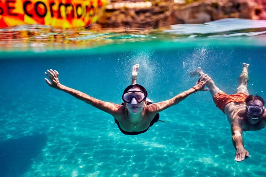 Mallorca: Caves, Cliffs, and Coves Boat Trip - What the onboard atmosphere is like