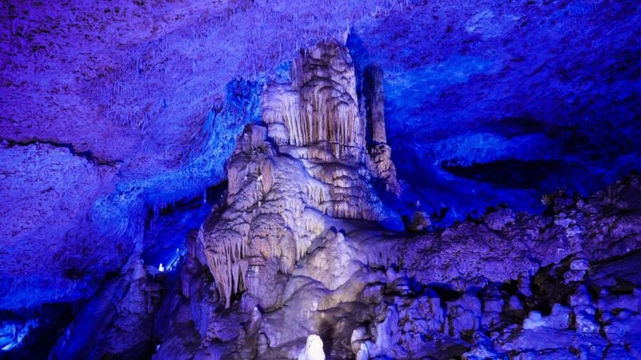 Mallorca: Half-Day Hams' Caves Tour with Pearl Shop Visit - Pickup from Mallorca’s main resort areas