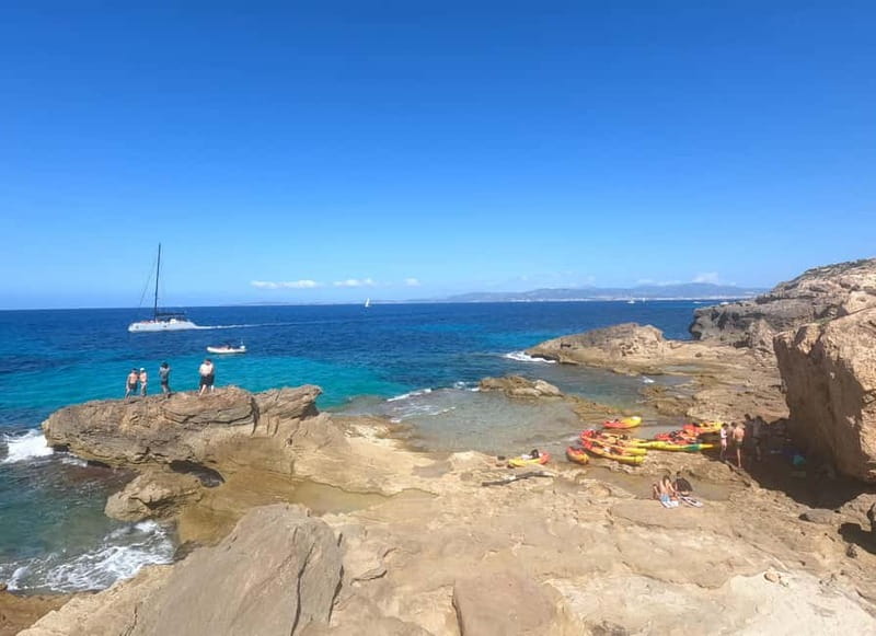 Mallorca: Sea Caves Kayaking Tour, Snorkeling & Snack - Returning by kayak and collecting the photographs