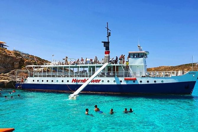 Malta: Comino, Blue Lagoon & Caves - swim, snorkel & slide - Crystal Lagoon and the optional cave ride