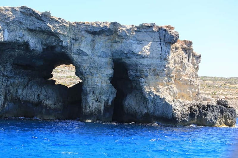 Malta: Comino, Blue Lagoon, + Sea Caves Day Trip - Crystal Lagoon, caves, and Elephant Rock on the return