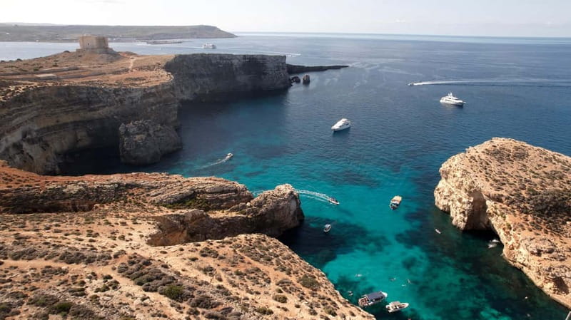 Malta: Comino, Gozo, Blue & Crystal Lagoon, and Caves Cruise - Comino’s caves and Elephant Rock