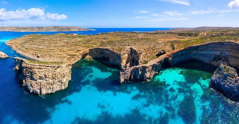 Malta: Comino, Santa Maria Bay, Blue Lagoon & Sea Caves Tour - Gozo Harbor and the ten-minute photo stop