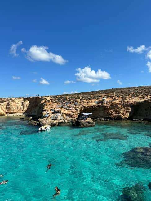 Malta: Gozo, Comino, Blue & Crystal Lagoon, & Caves Cruise - The Blue Lagoon: swimming, snorkeling, and the slide