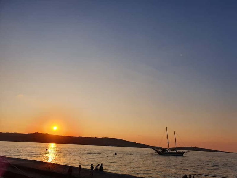 Malta: Sunset Cruise to Blue Lagoon and Caves - Crystal Lagoon: a scenic pause before the main stop