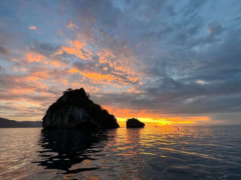 Mismaloya: Los Arcos Bioluminescent Waters Kayak & Cave Tour - Paddling toward Los Arcos before the crowds