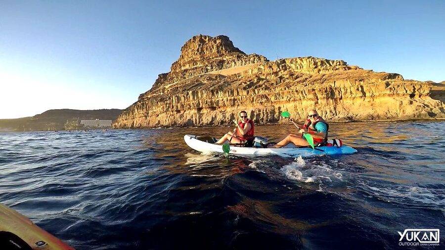 Mogán: Guided Kayak to Caves and Snorkeling Tour - Paddling under Gran Canaria’s white cliffs