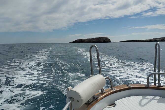 Monopoli Shared tour by Gozzo boat to the Polignano caves - Grotta Palazzese from below