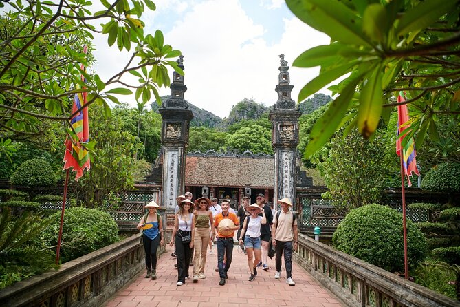 Ninh Binh Day Trip: Bai Dinh-Trang An-Mua Cave, Buffet, Boat, Bus - Bai Dinh Pagoda and its oversized numbers