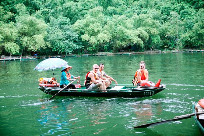 Ninh Binh Full-Day Tour from Hanoi to Hoa Lu, Tam Coc & Mua Cave Via Boat & Bike - Leaving Hanoi and reaching the countryside