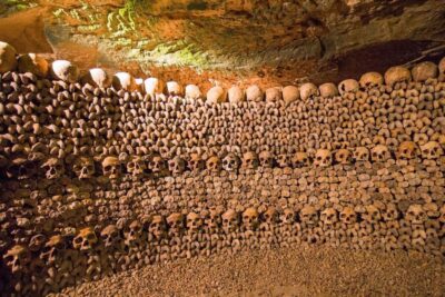 Catacombs Entry & Seine River Cruise with Audio Guide