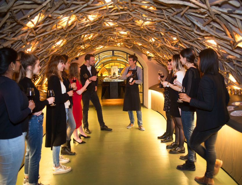 Paris: Les Caves du Louvre Guided Tour with Wine Tastings - From grape to bottle, one room at a time
