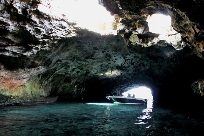 Polignano a Mare boat tour emotions, caves, diving and appetizers - The onboard aperitivo at Lama Monachile