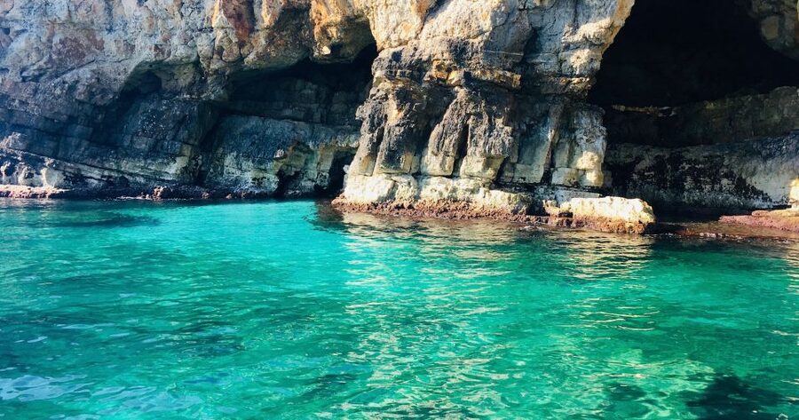 Polignano a Mare: Boat Trip, Swim & Cave with Aperitif - Lama Monachile and the Domenico Modugno view