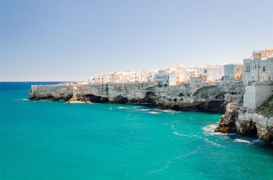 Polignano a Mare: Cave Boat Tour with Aperitif - A small boat, a lively crew, and changing sea conditions