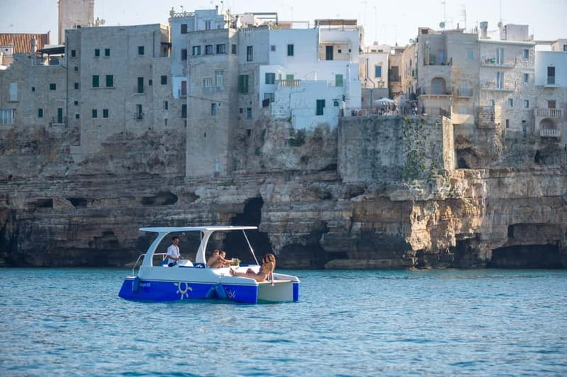 Polignano a Mare: Eco Boat Tour with Snorkeling and Caves - The skipper and the mood on board