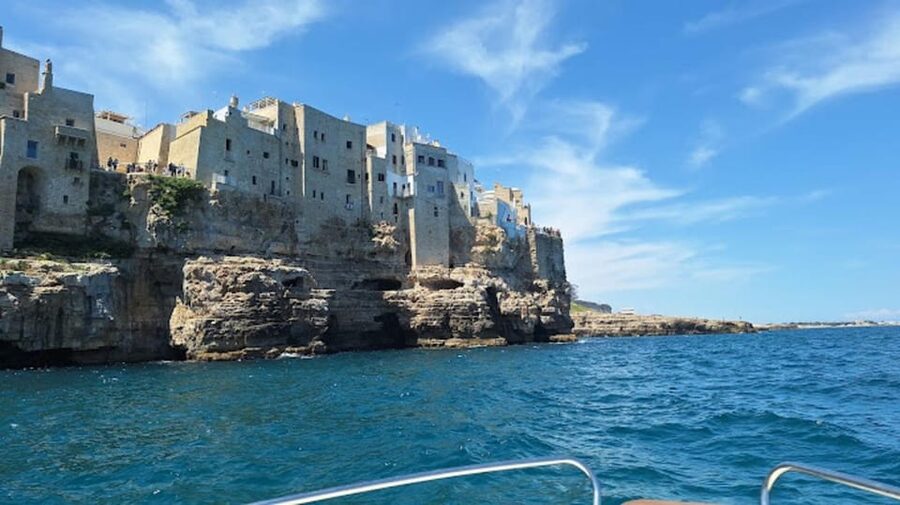 Polignano's coast and caves: a boat tour with drinks, swimming, music, and fun - The monastery and first coastal views