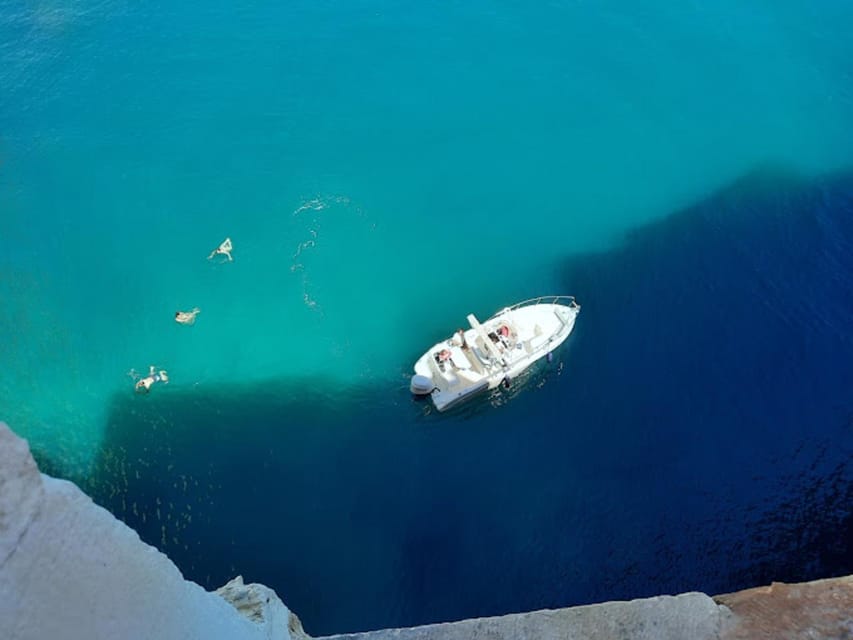 Polignano's coast and caves: a boat tour with drinks, swimming, music, and fun - Grotta Palazzese and the swim stop