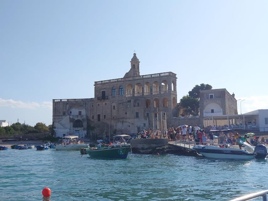 Polignano's coast and caves: a boat tour with drinks, swimming, music, and fun - Hermit’s Rock and the lesser-known inlets