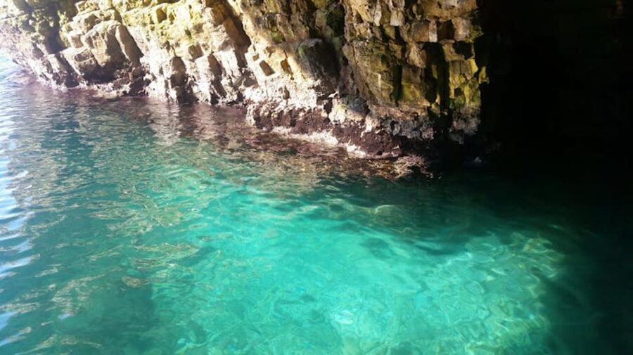 Polignano's coast and caves: a boat tour with drinks, swimming, music, and fun - Leaving from San Vito port