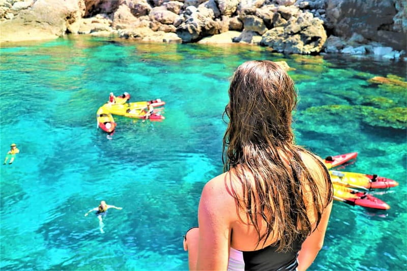 Pollença: Kayak Discovery – Snorkeling and Caves - Entering a sea cave when conditions allow