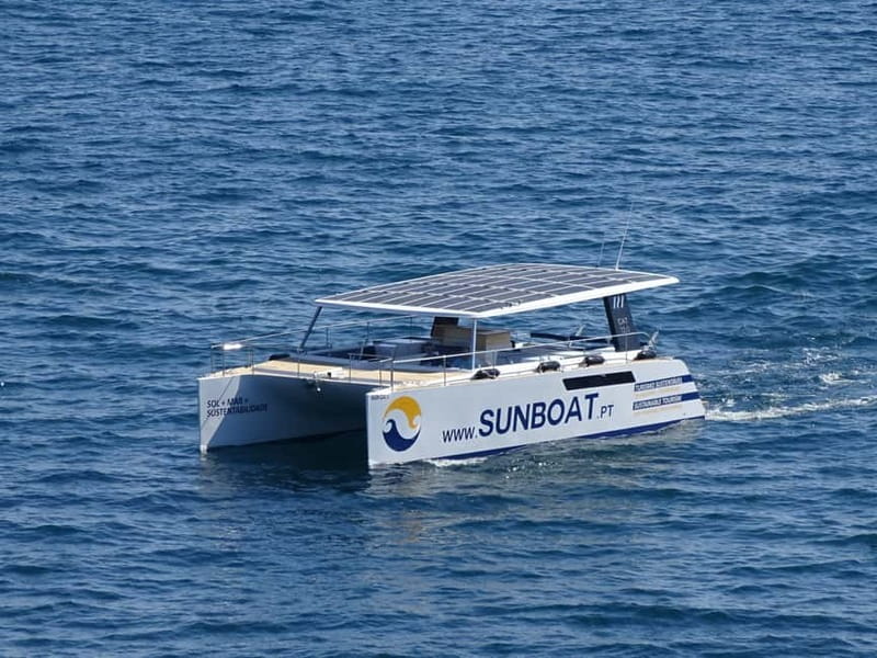 Portimão: Benagil Caves & Golden Coast Eco Catamaran Tour - Along the golden coast toward Carvoeiro