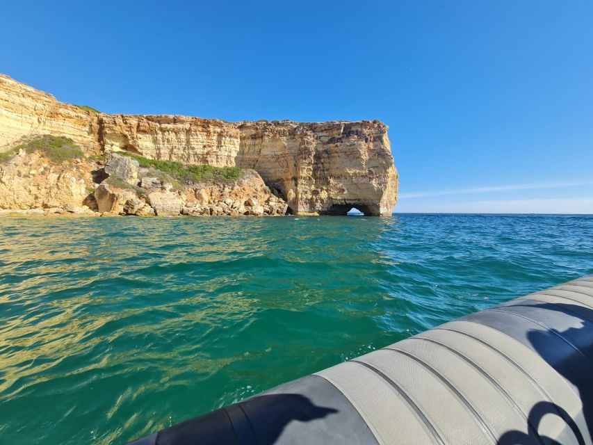 Portimão: Guided Coastal Caves Tour by Boat - Entering the caves from the water