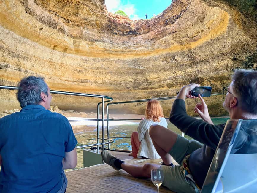 Portimao: SUNSET Benagil Caves Tour | Eco Catamaran - Sunset belongs to the return trip