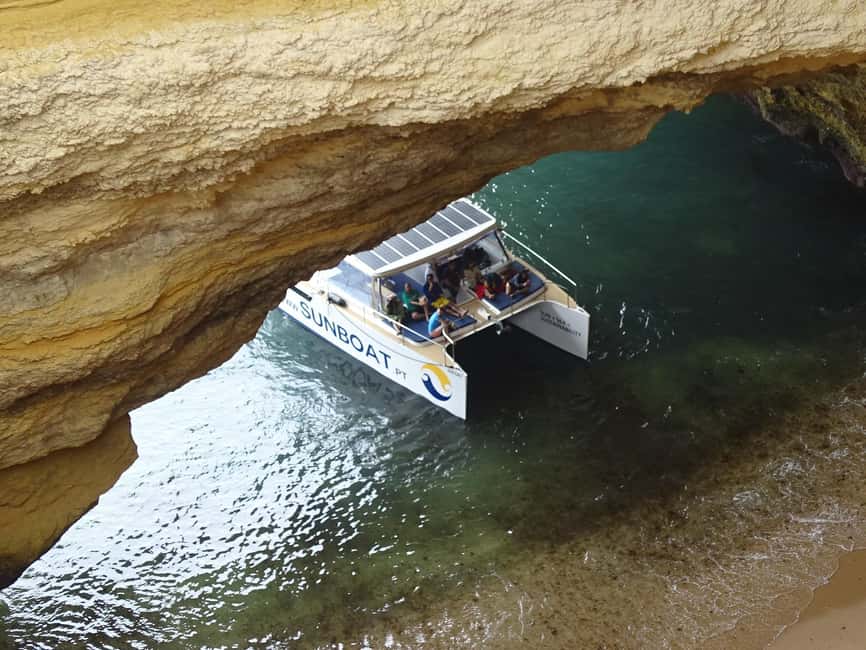 Portimao: SUNSET Benagil Caves Tour | Eco Catamaran - A quiet ride along the Algarve cliffs