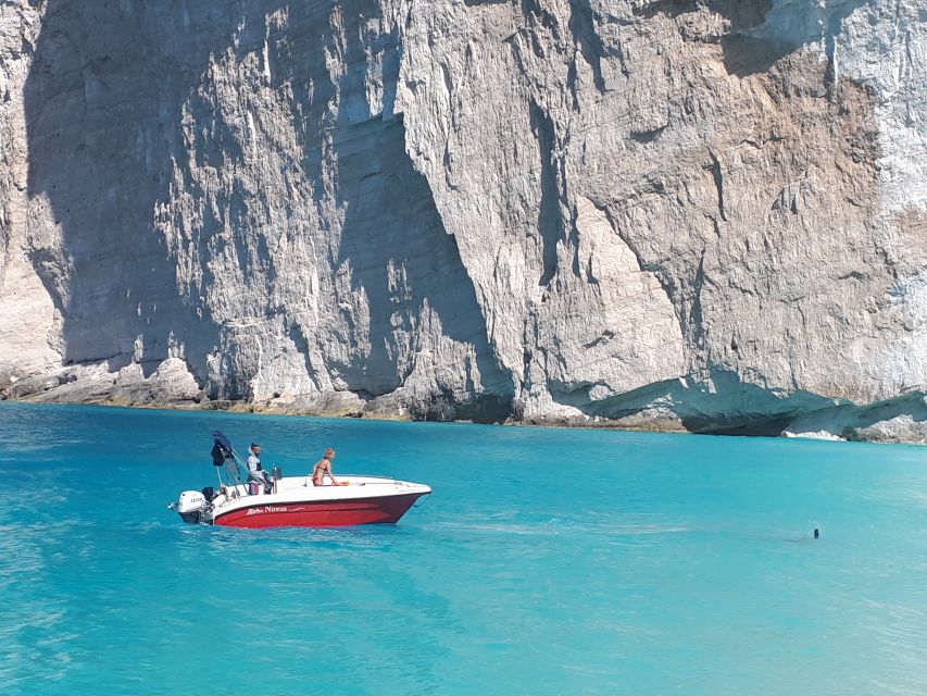 Porto Vromi: Navagio Beach & Blue Caves Private Boat Tour - Swimming and snorkeling along the quieter coast