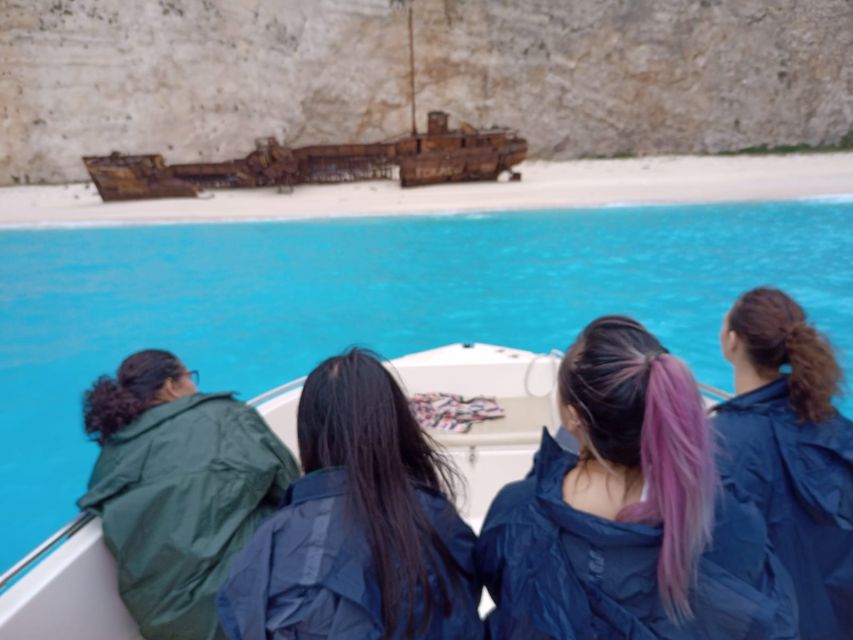 Porto Vromi: Navagio Beach & Blue Caves Private Boat Tour - Entering Hidden Treasure Cave by boat