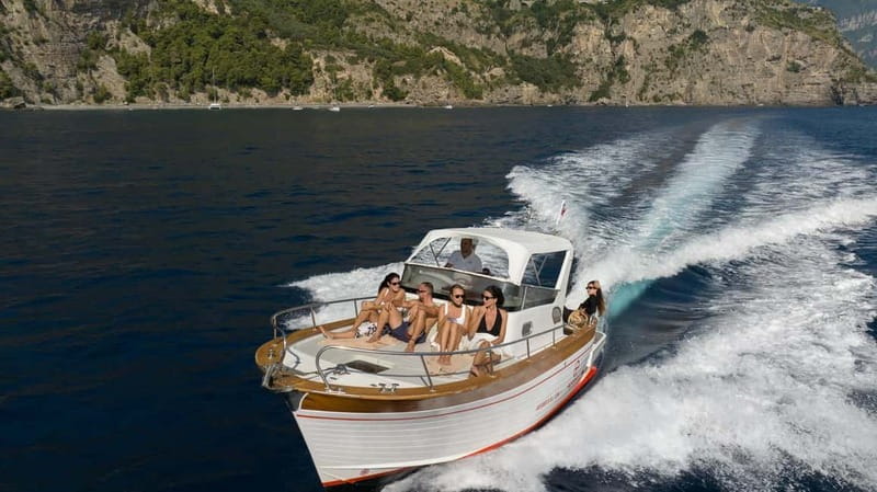 Positano: Amalfi Coast & Emerald Grotto Private Boat Tour - Swimming and snorkeling at Scoglio dell’Isca