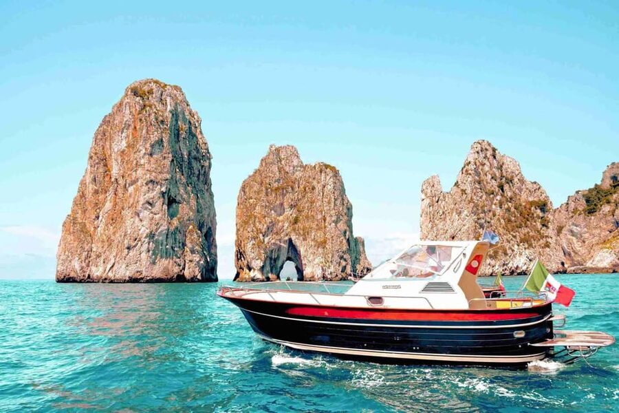 Positano: Capri and Blue Grotto Shared Boat Tour with Drinks - Circling Capri by boat