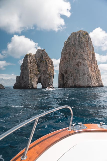 Positano: Capri and Blue Grotto Shared Boat Tour with Drinks - Drinks aboard and limoncello on the way home