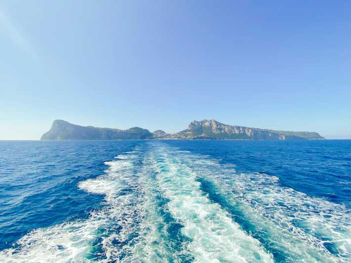 Positano: Capri and Blue Grotto Shared Boat Tour with Drinks - Entering the Blue Grotto near Capri