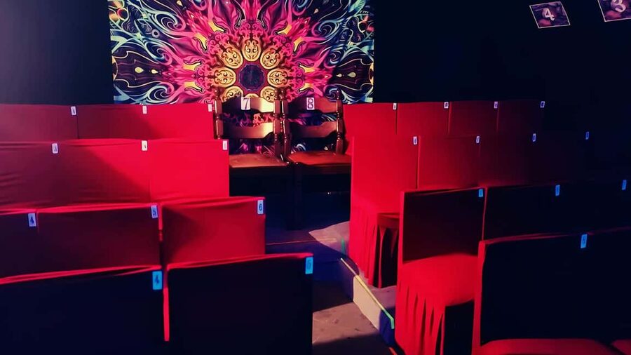 Prague: Underground Black Light Theatre Interactive Show - Images of Love moves from romance to comedy