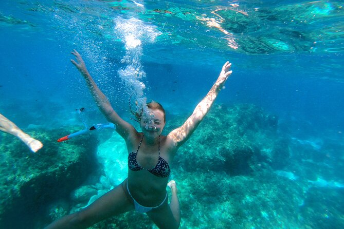 Private Boat Tour to Blue Lagoon Comino Caves and Gozo - Blue Lagoon: beautiful, famous, and busier