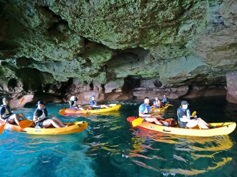 Puerto Mogán: Guided Adventure Kayak Tour in Caves & Snorkel - The wild beach and snorkeling stop