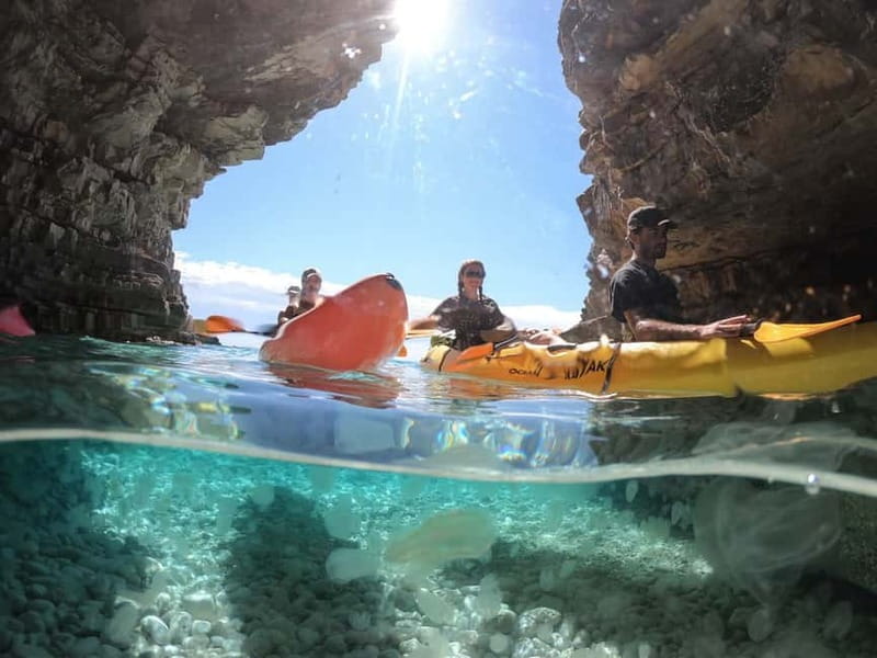 Pula: Cave Kayak, Snorkeling, Cliff Jumping All-in-one Tour - The 50-minute paddle along the rocky coast