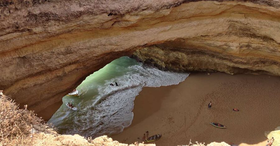 Quarteira: Benagil Cave Guided Catamaran Day Cruise & Drink - Reaching Benagil Cave by catamaran