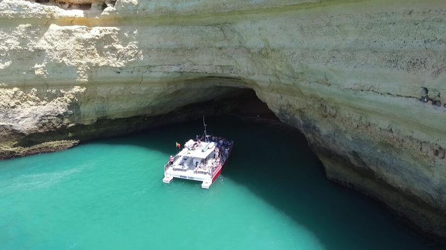 Quarteira: Benagil Cave Guided Catamaran Day Cruise & Drink - Why the coastal sightseeing matters