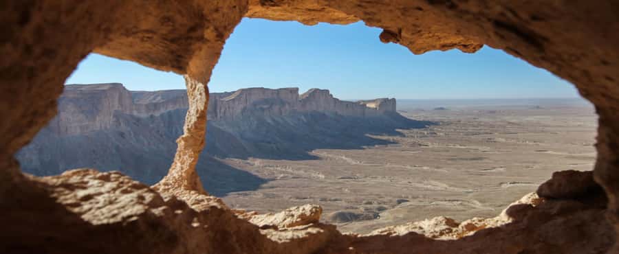 Riyadh Edge of The World and Bat Cave Visit by Bus - Sunset, dinner, and the changing desert light