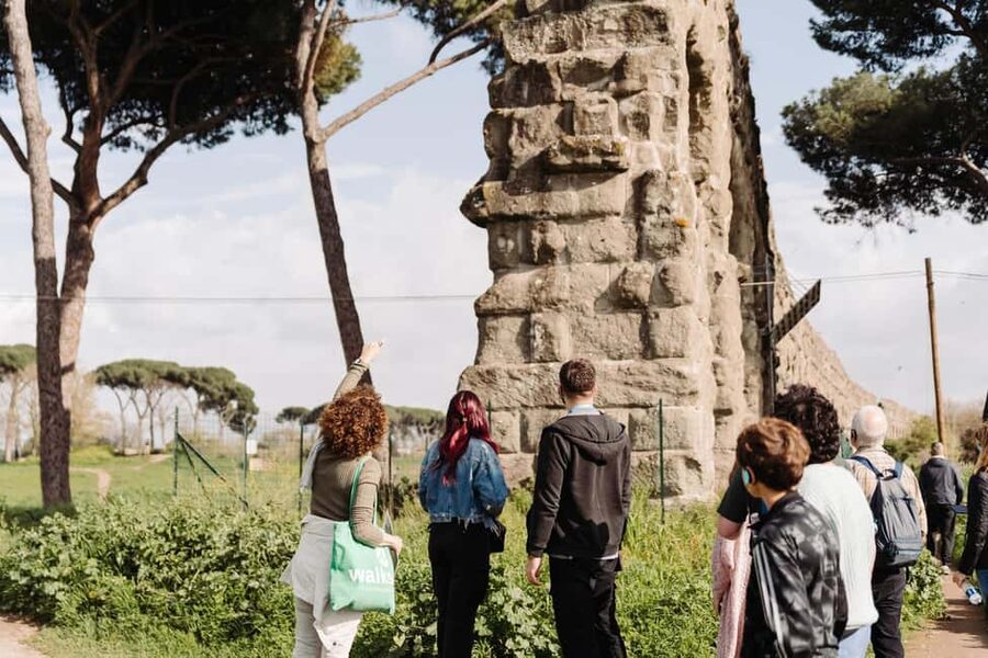 Rome: Appian Way, Aqueducts, and Catacombs Tour - Entering the catacombs at San Sebastiano or Domitilla