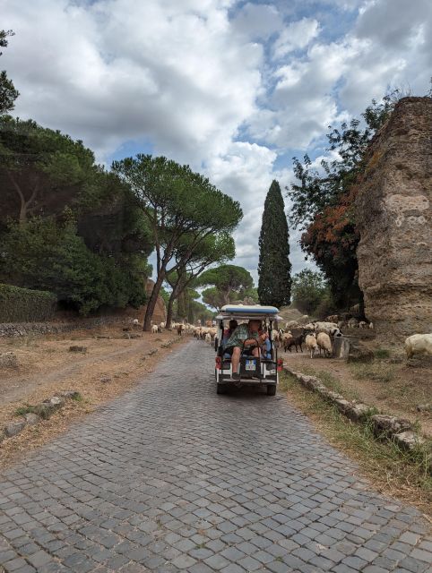 Rome: Appian Way & Catacombs Golf Cart Shared Tour - Descending into the Roman catacombs